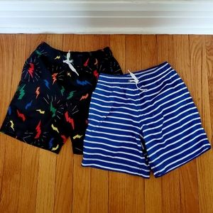 TWO Hanna Andersson swim trunks in bright, fun patterns! Both 120cm (US 6-7)